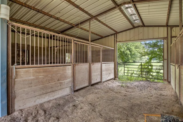 a view of a lake with a yard