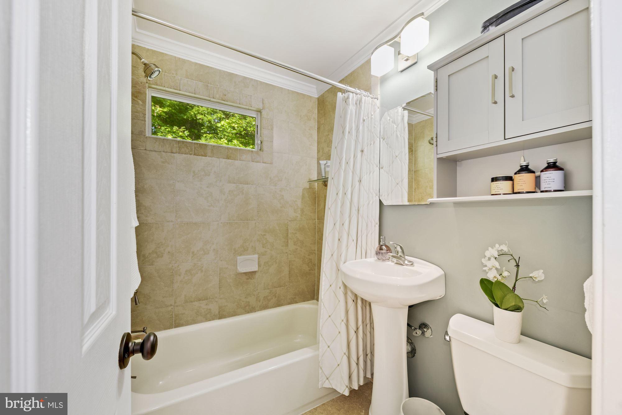12302 Dewey Road Silver Spring, MD 20906 - Photo 11 of 26 Full Bath with New Cabinet & Tub Shower