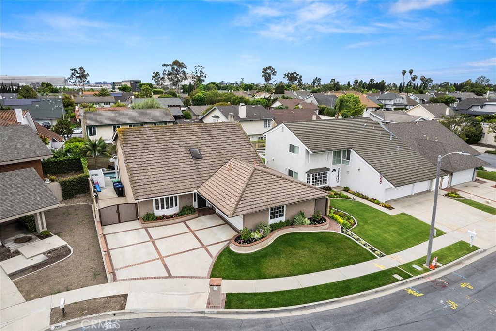 2352 Caper Tree Drive Tustin, CA 92780 - Photo 28 of 29 an aerial view of a house having yard