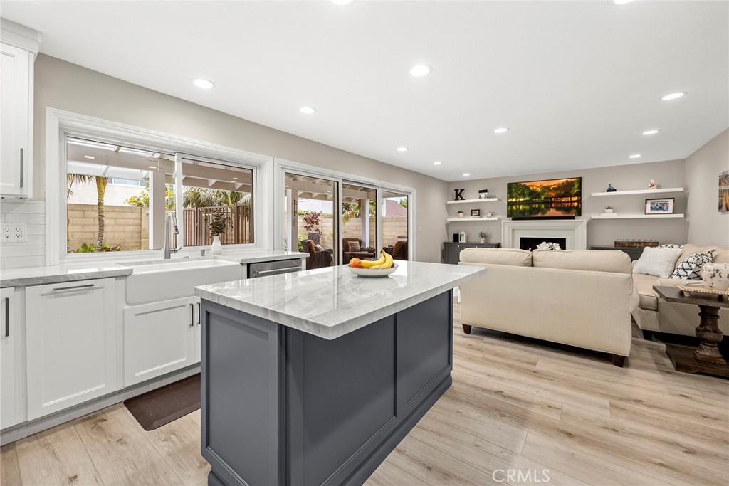 2352 Caper Tree Drive Tustin, CA 92780 - Photo 7 of 29 a living room with furniture and a large window