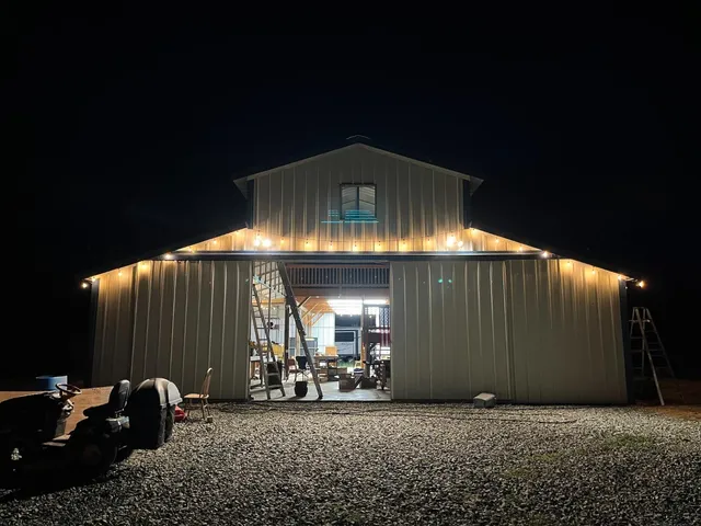 an outdoor space with furniture and garden