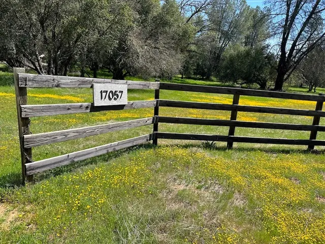a view of a lake with a yard