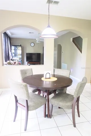 a view of a dining room with furniture