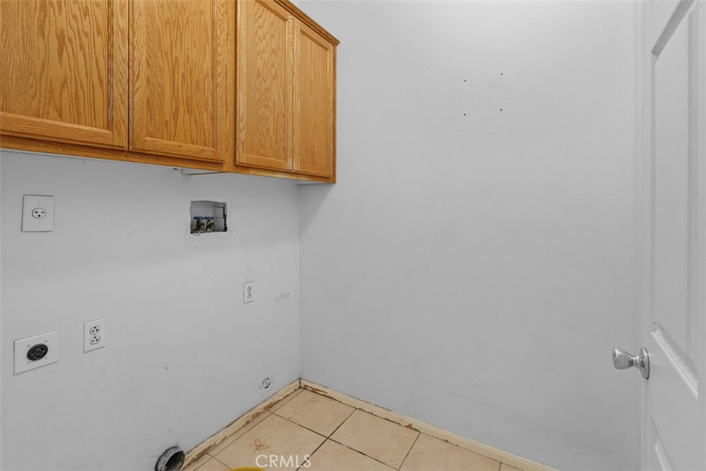 68744 Durango Road Cathedral City, CA 92234 - Photo 20 of 36 a view of a room with wooden floor and cabinet