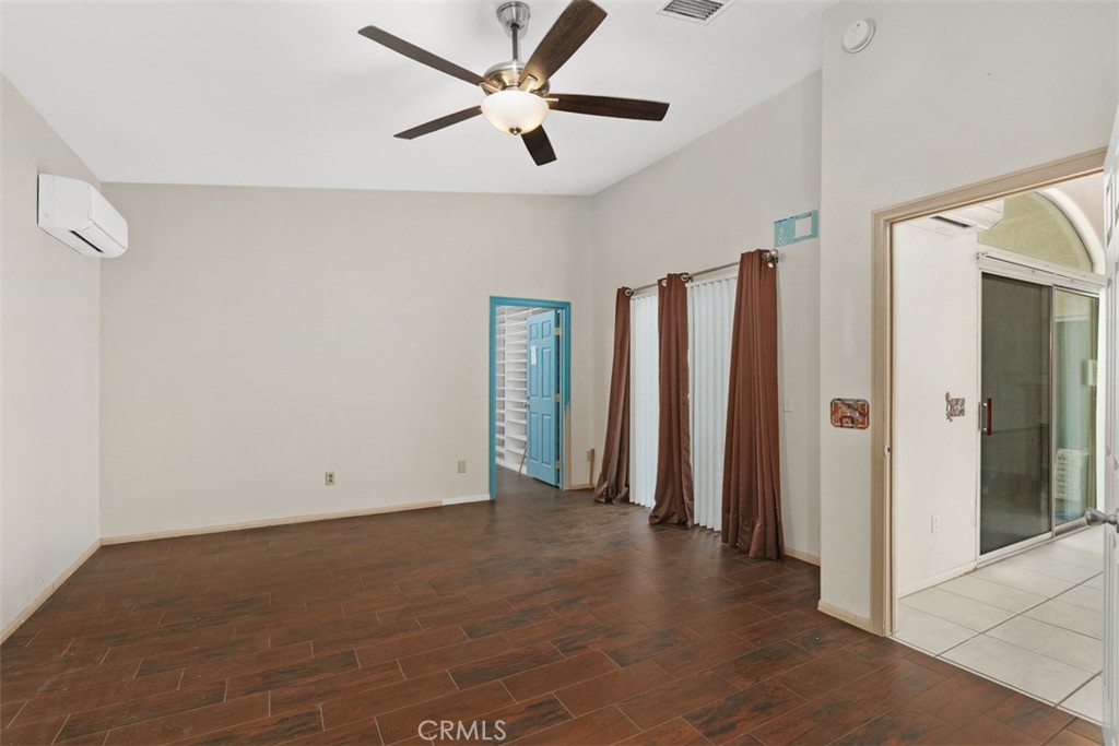 68744 Durango Road Cathedral City, CA 92234 - Photo 26 of 36 an empty room with closet and a ceiling fan