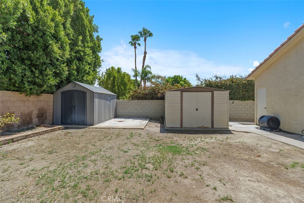68744 Durango Road Cathedral City, CA 92234 - Photo 33 of 36 a house view with a backyard space
