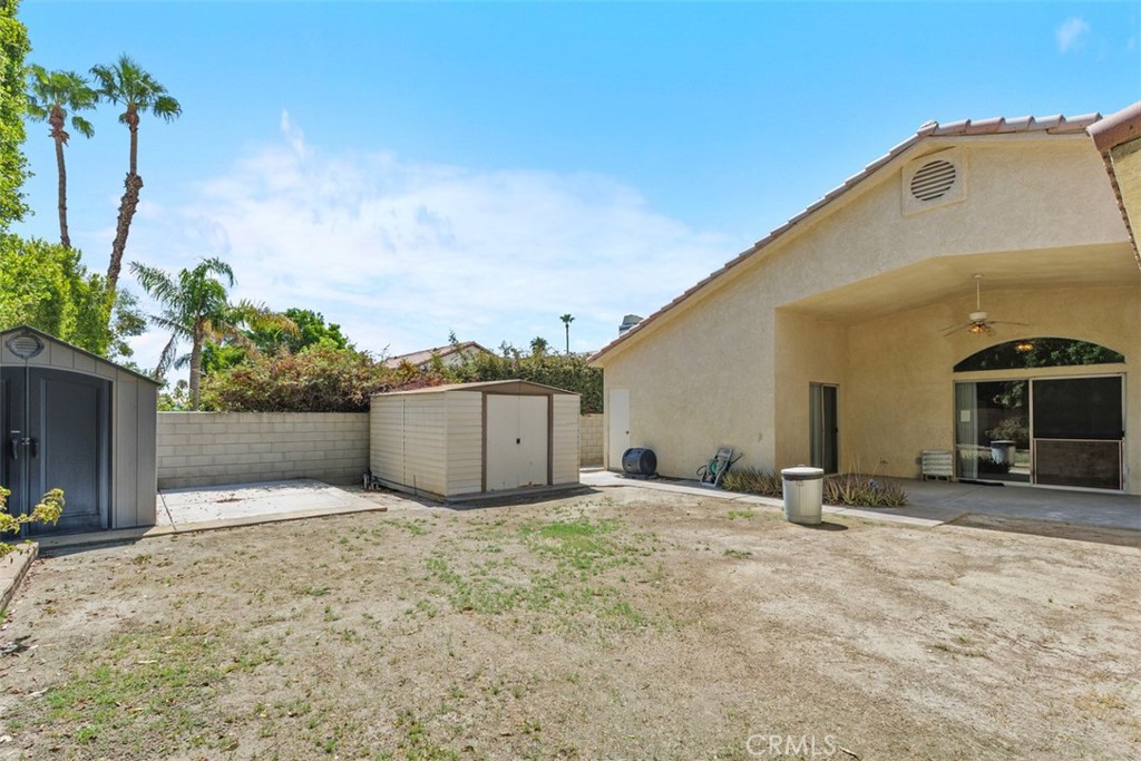 68744 Durango Road Cathedral City, CA 92234 - Photo 36 of 36 a view of a house with a yard
