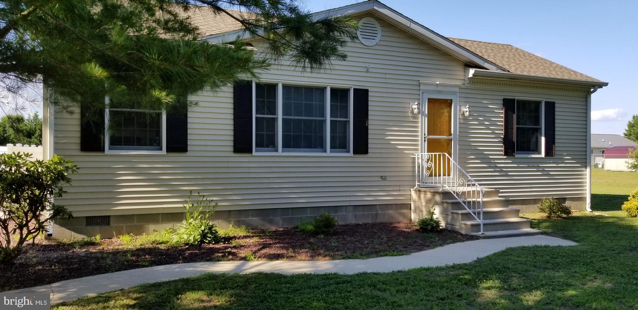 Front of home before door painted