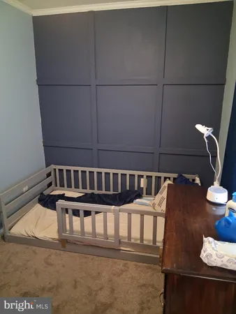 a room with furniture and mirror