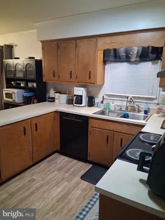 a kitchen with a stove and a microwave