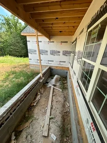 a view of swimming pool with a large window