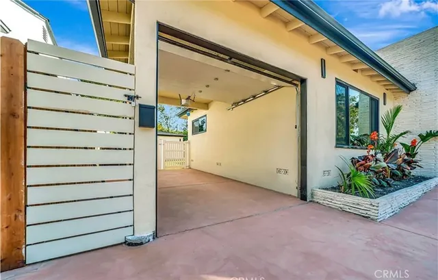 a bathroom with a toilet a sink and a mirror