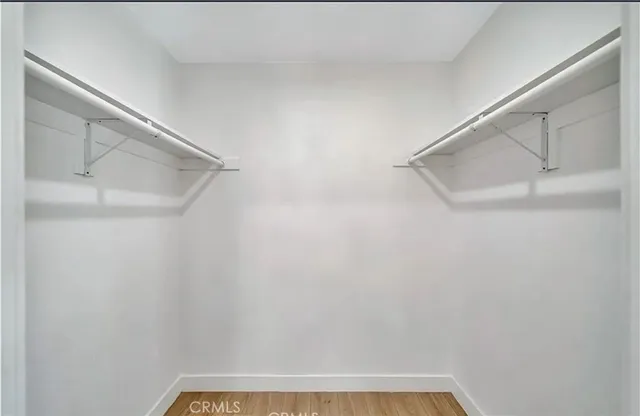 a view of a room with a large window