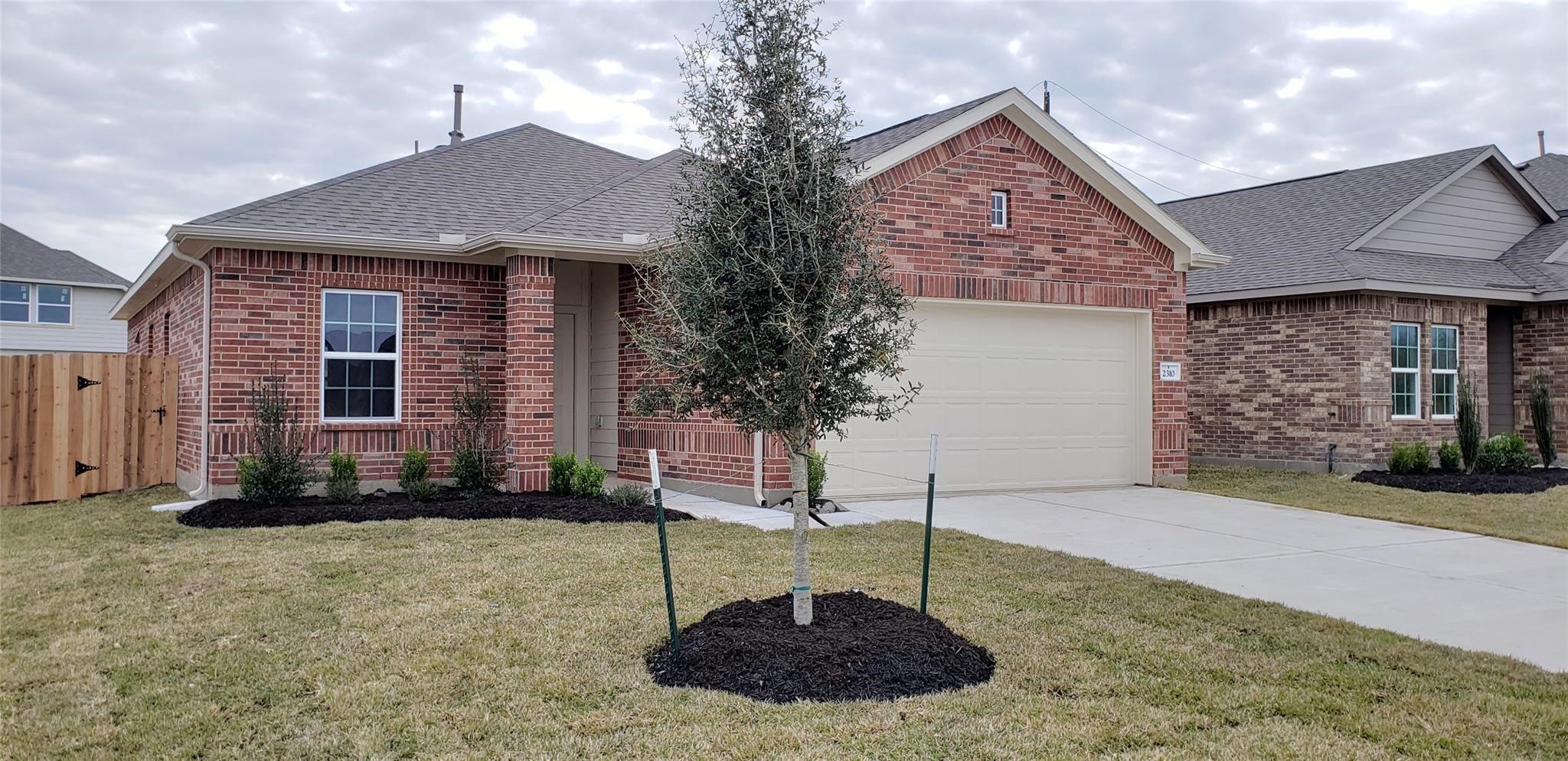 2310 Thunderbolt Peak Drive Rosharon, TX 77583 - Photo 1 of 27 a front view of a house with a yard