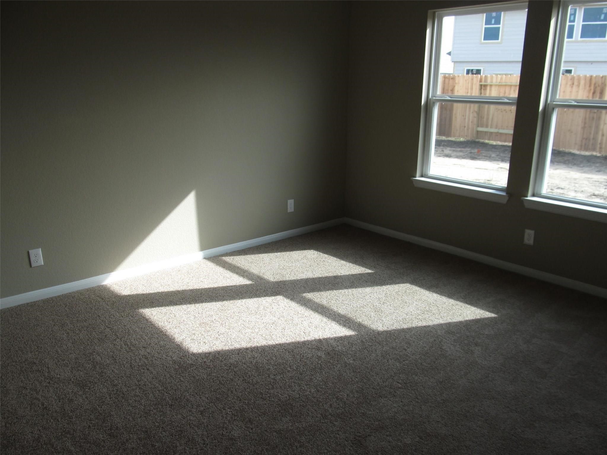 2310 Thunderbolt Peak Drive Rosharon, TX 77583 - Photo 11 of 27 an empty room with windows