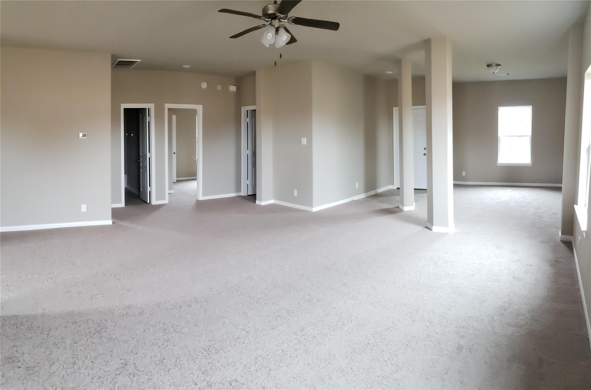 2310 Thunderbolt Peak Drive Rosharon, TX 77583 - Photo 23 of 27 an empty room with fan and entrance