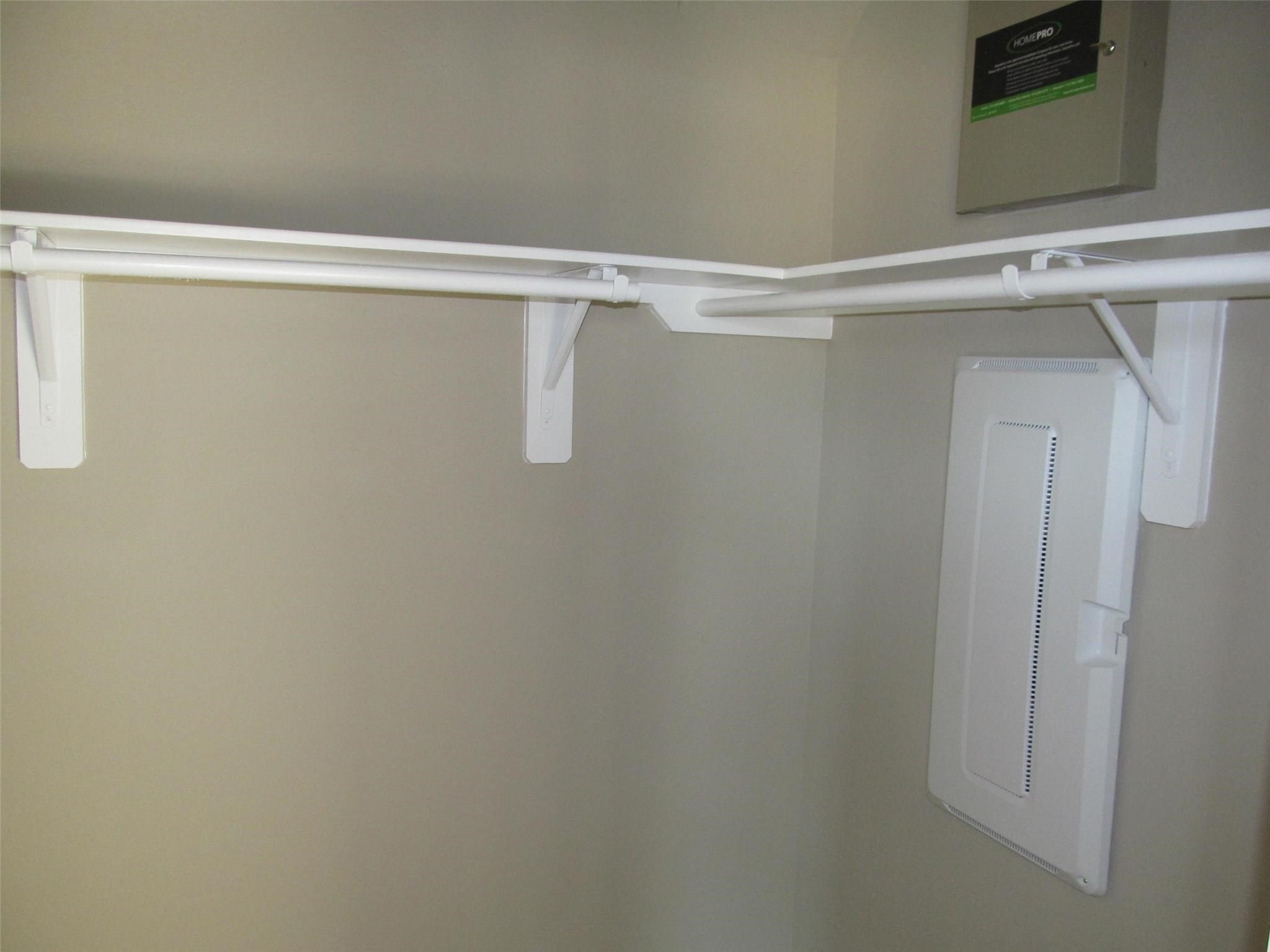 2310 Thunderbolt Peak Drive Rosharon, TX 77583 - Photo 9 of 27 a view of a room with racks on the wall