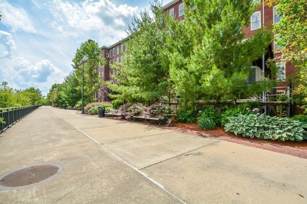 35 Riverwalk Way, Unit R302 Lowell, MA 01854 - Photo 18 of 20 a view of backyard with outdoor space