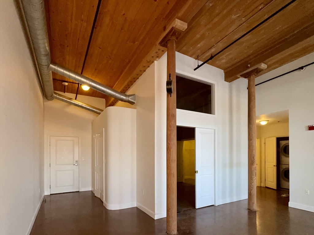 35 Riverwalk Way, Unit R302 Lowell, MA 01854 - Photo 5 of 20 a view of entryway with wooden floor