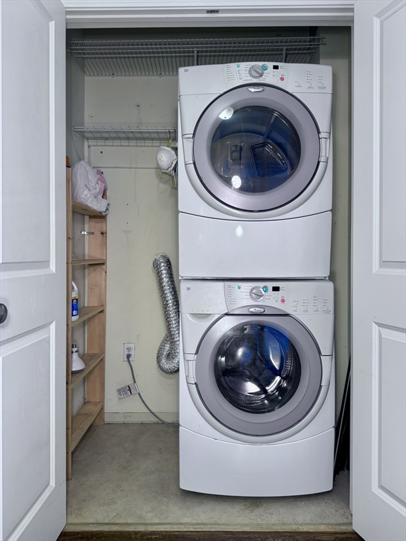 35 Riverwalk Way, Unit R302 Lowell, MA 01854 - Photo 9 of 20 a utility room with dryer and washer