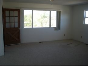 2117 North Reed Road Chino Valley, AZ 86323 - Photo 2 of 11 an empty room with a window