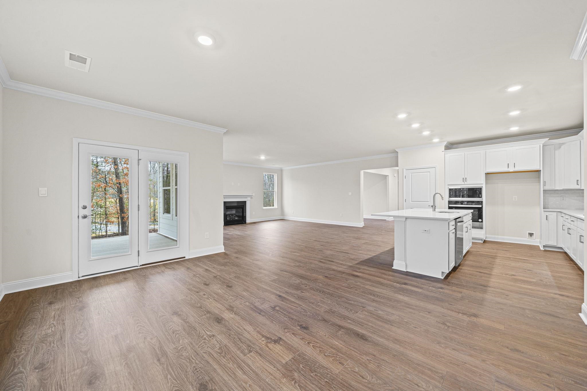128 Jaspers Lane Stuarts Draft, VA 24477 - Photo 11 of 26 a view of kitchen with furniture and wooden floor