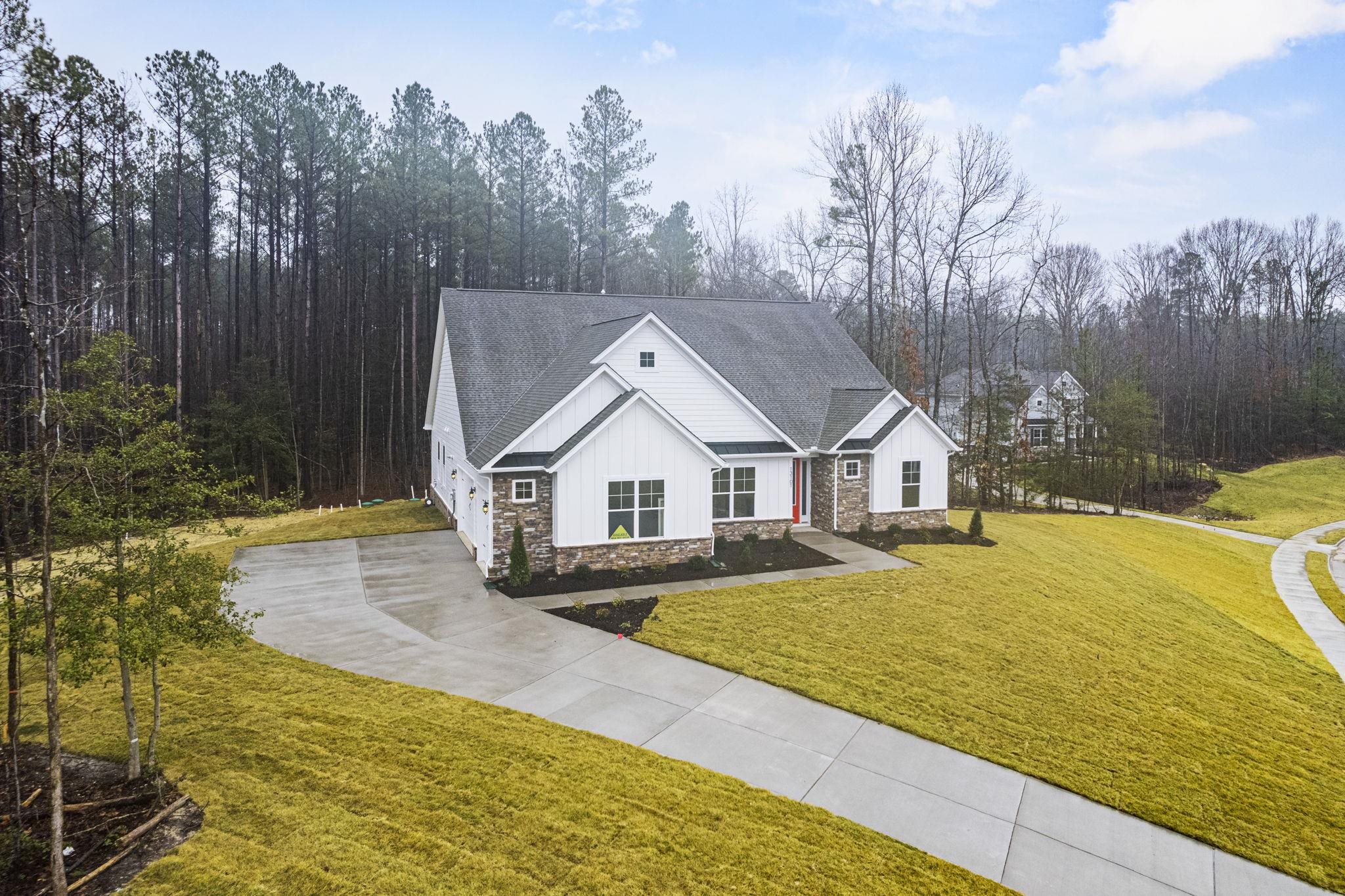 128 Jaspers Lane Stuarts Draft, VA 24477 - Photo 2 of 26 a view of house and outdoor space with swimming pool and trees in the background