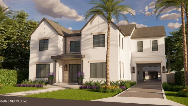 a front view of a house with a yard and potted plants