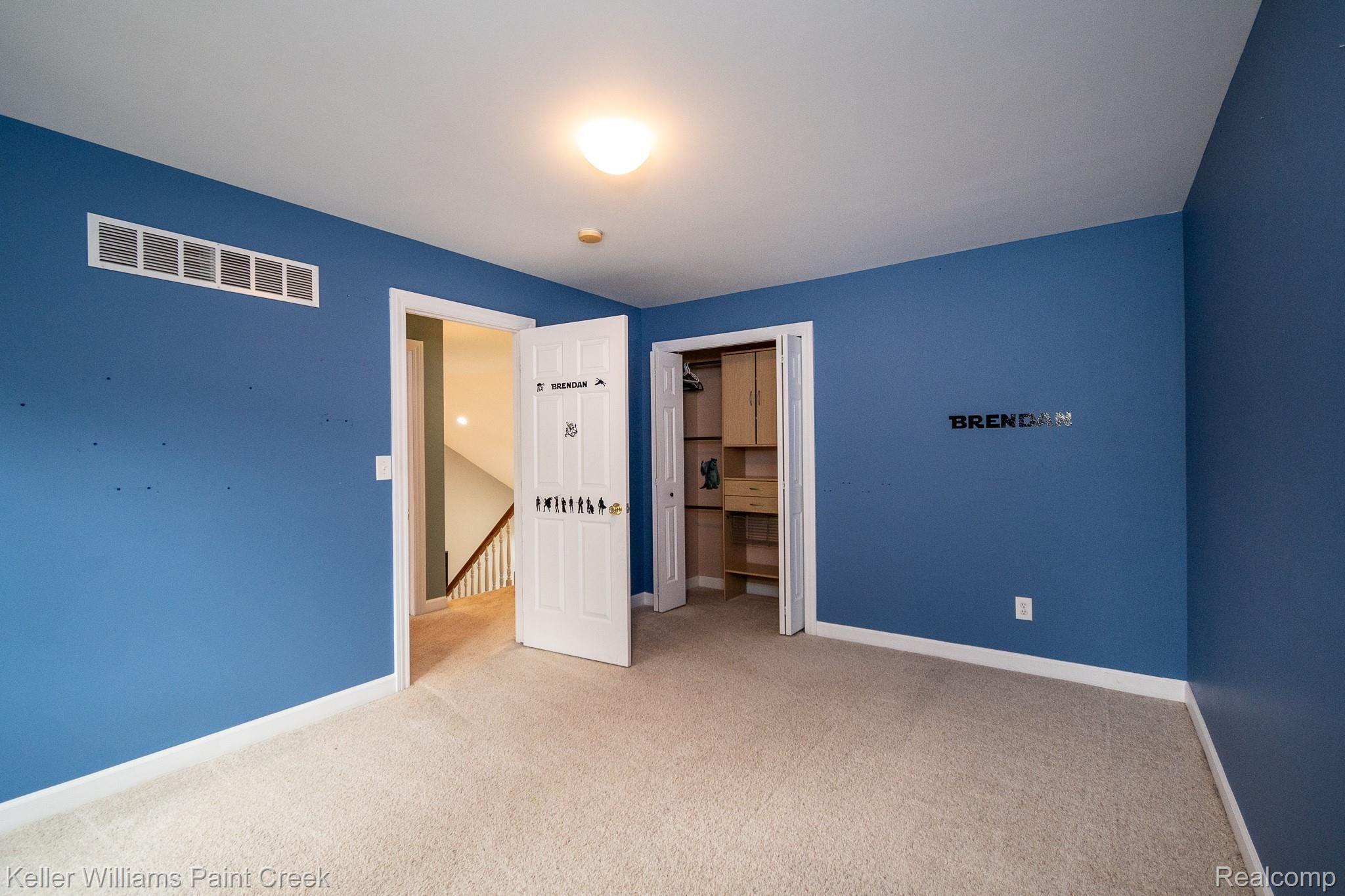 3307 Hazelton Avenue Rochester, MI 48307 - Photo 27 of 41 Upper level bedroom with closet featuring built in storage space!