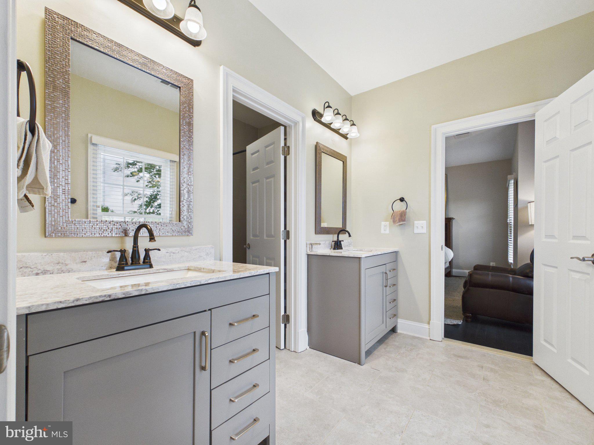 38565 Piggott Bottom Road Hamilton, VA 20158 - Photo 34 of 85 a en suite bathroom with a double vanity sink and mirror