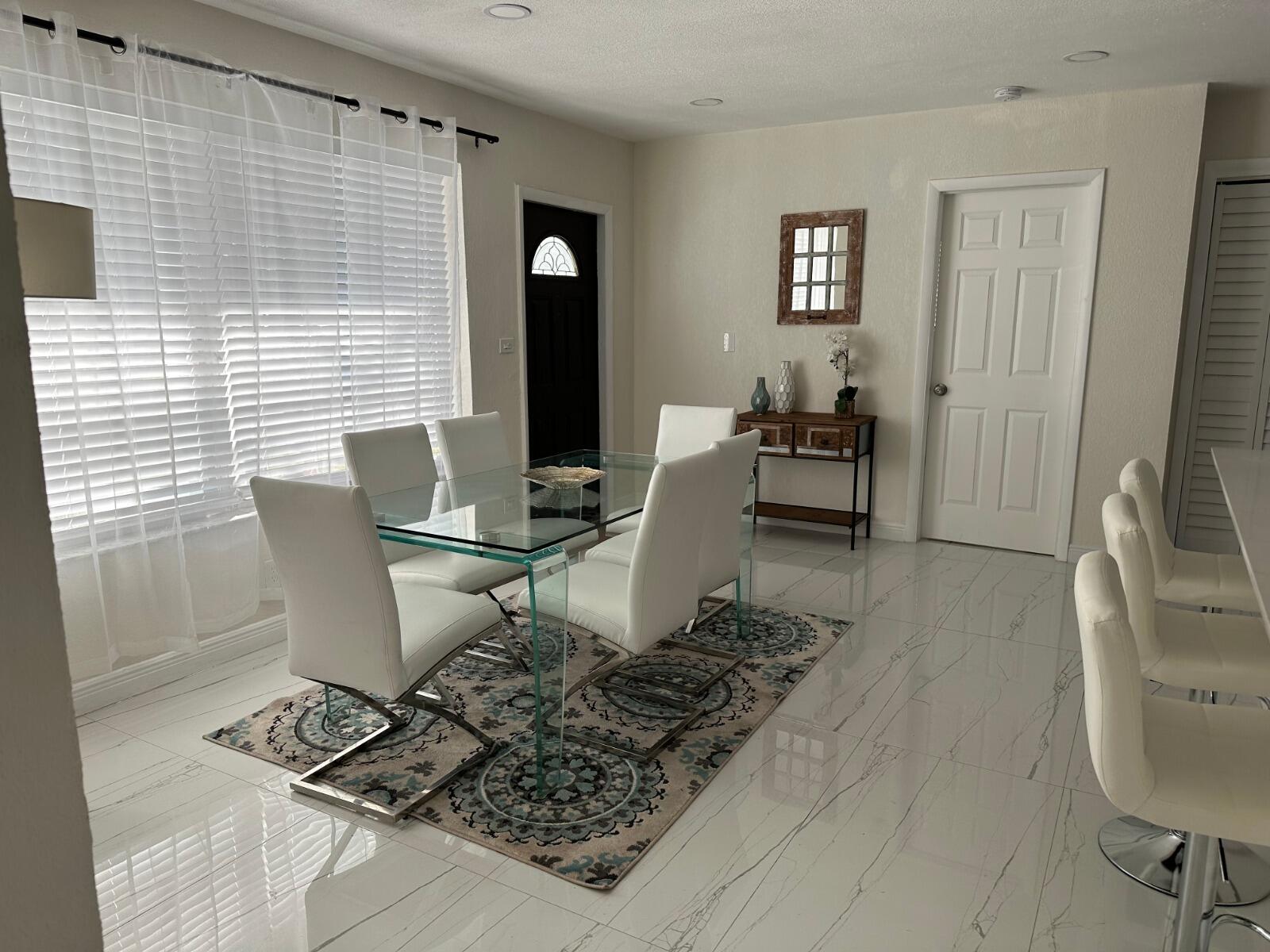 5131 Southwest 6th Court Margate, FL 33068 - Photo 18 of 25 a living room with furniture and a window