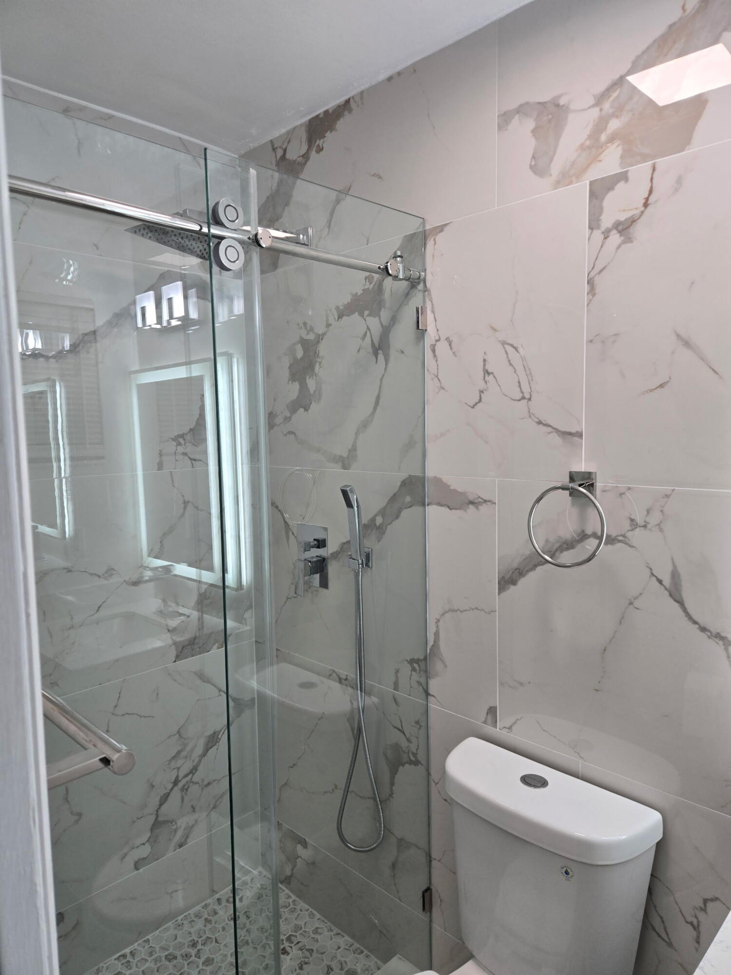 5131 Southwest 6th Court Margate, FL 33068 - Photo 19 of 25 a bathroom with a shower and toilet
