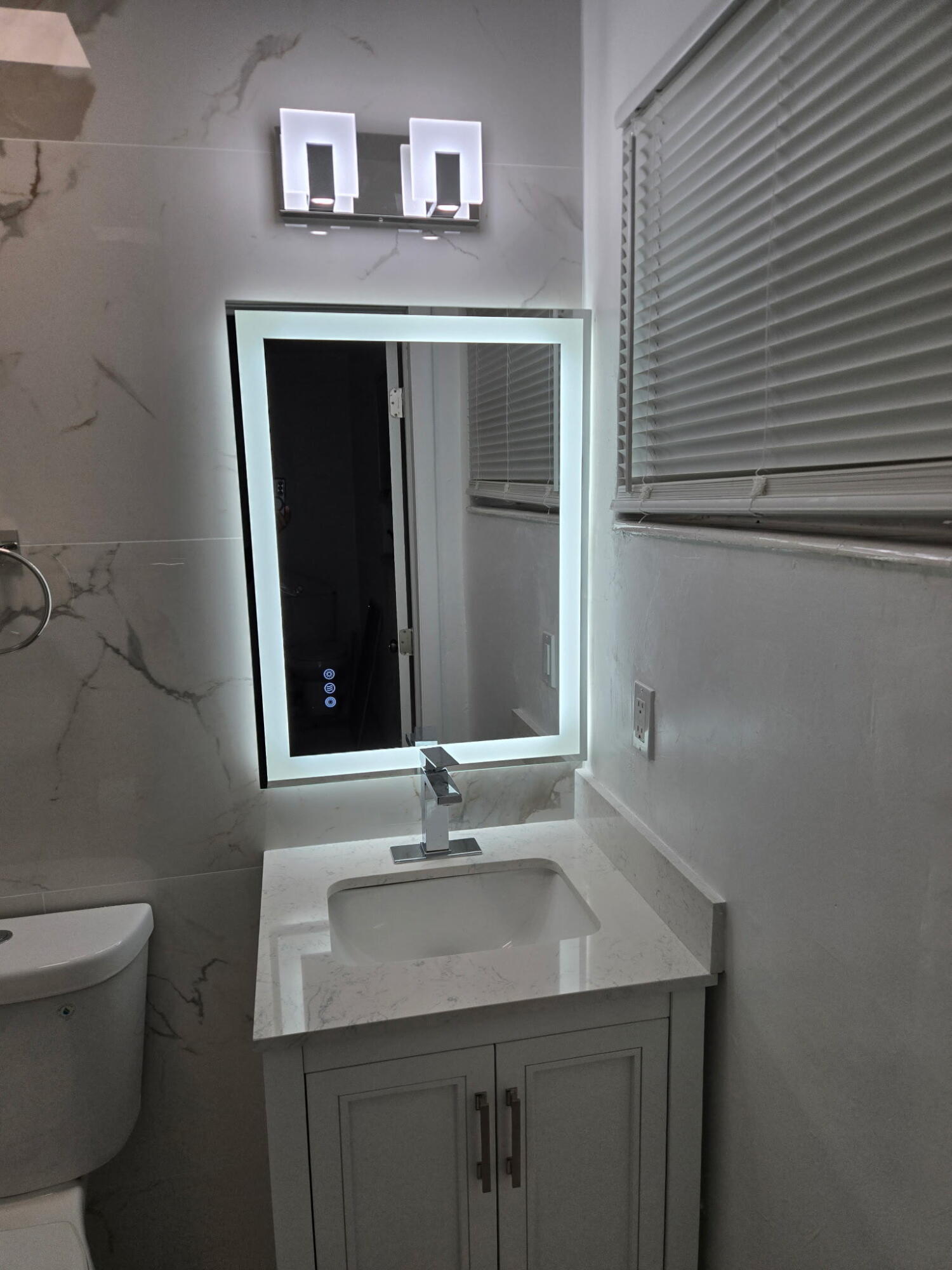 5131 Southwest 6th Court Margate, FL 33068 - Photo 20 of 25 a bathroom with a sink and a toilet