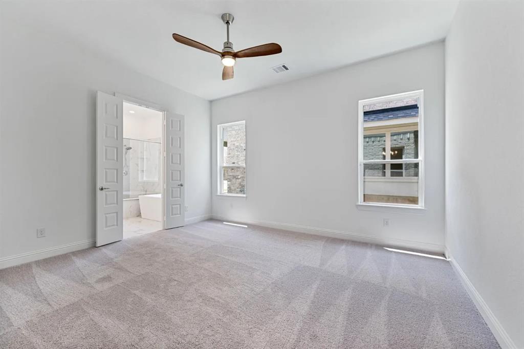 9337 Loggerhead Way Fort Worth, TX 76118 - Photo 24 of 40 a view of an empty room with a window
