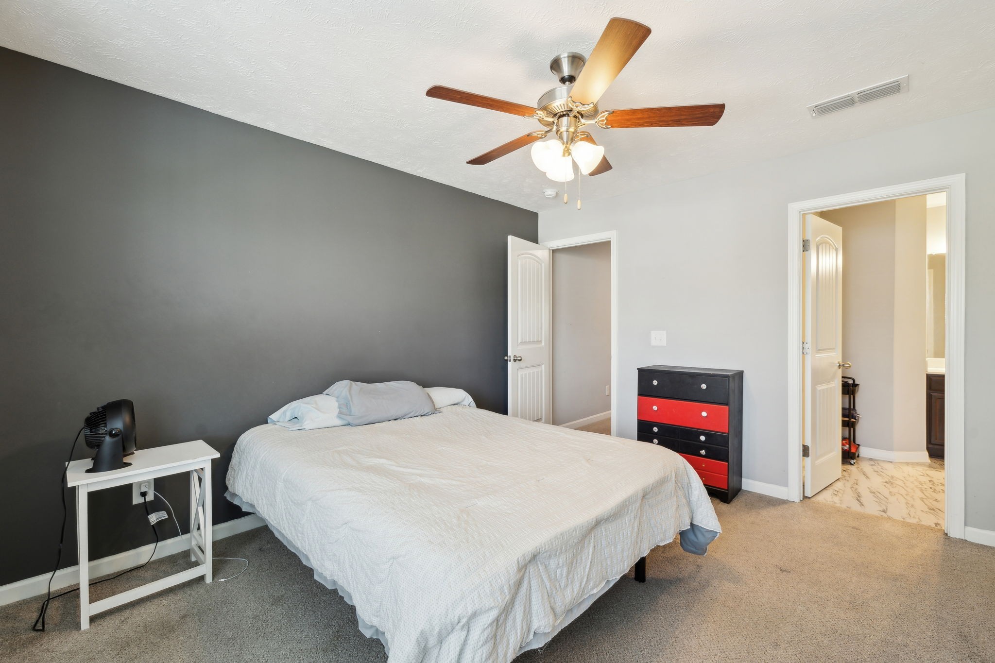 2336 Convention Way Murfreesboro, TN 37130 - Photo 13 of 23 a bedroom with a bed and a chandelier