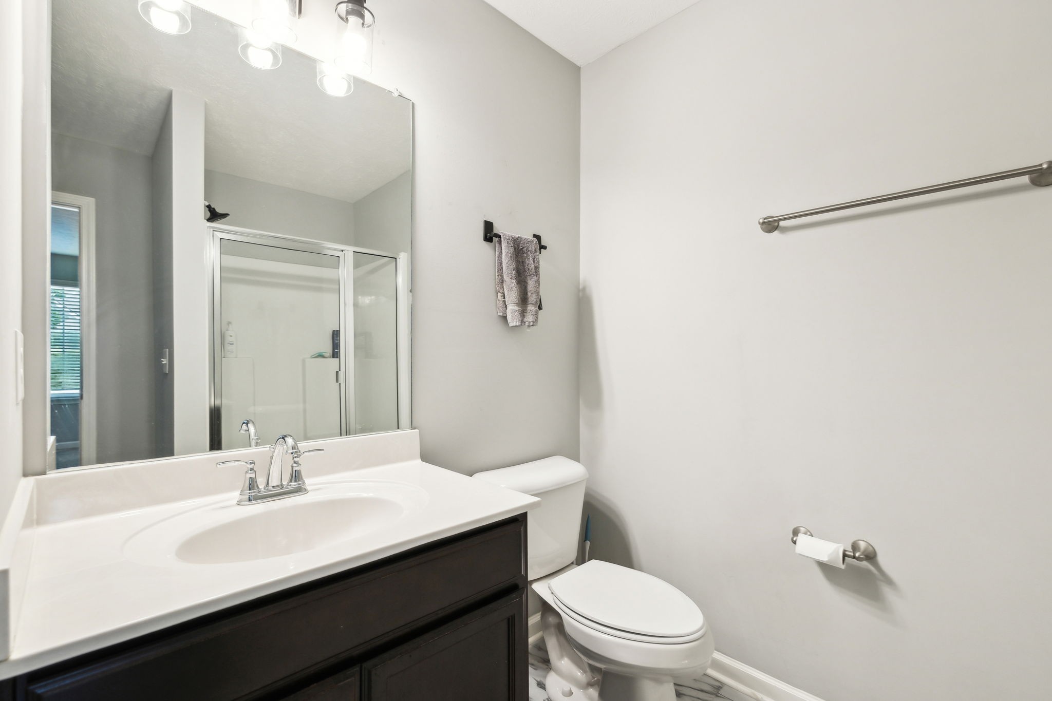2336 Convention Way Murfreesboro, TN 37130 - Photo 15 of 23 a bathroom with a sink a toilet a mirror and shower