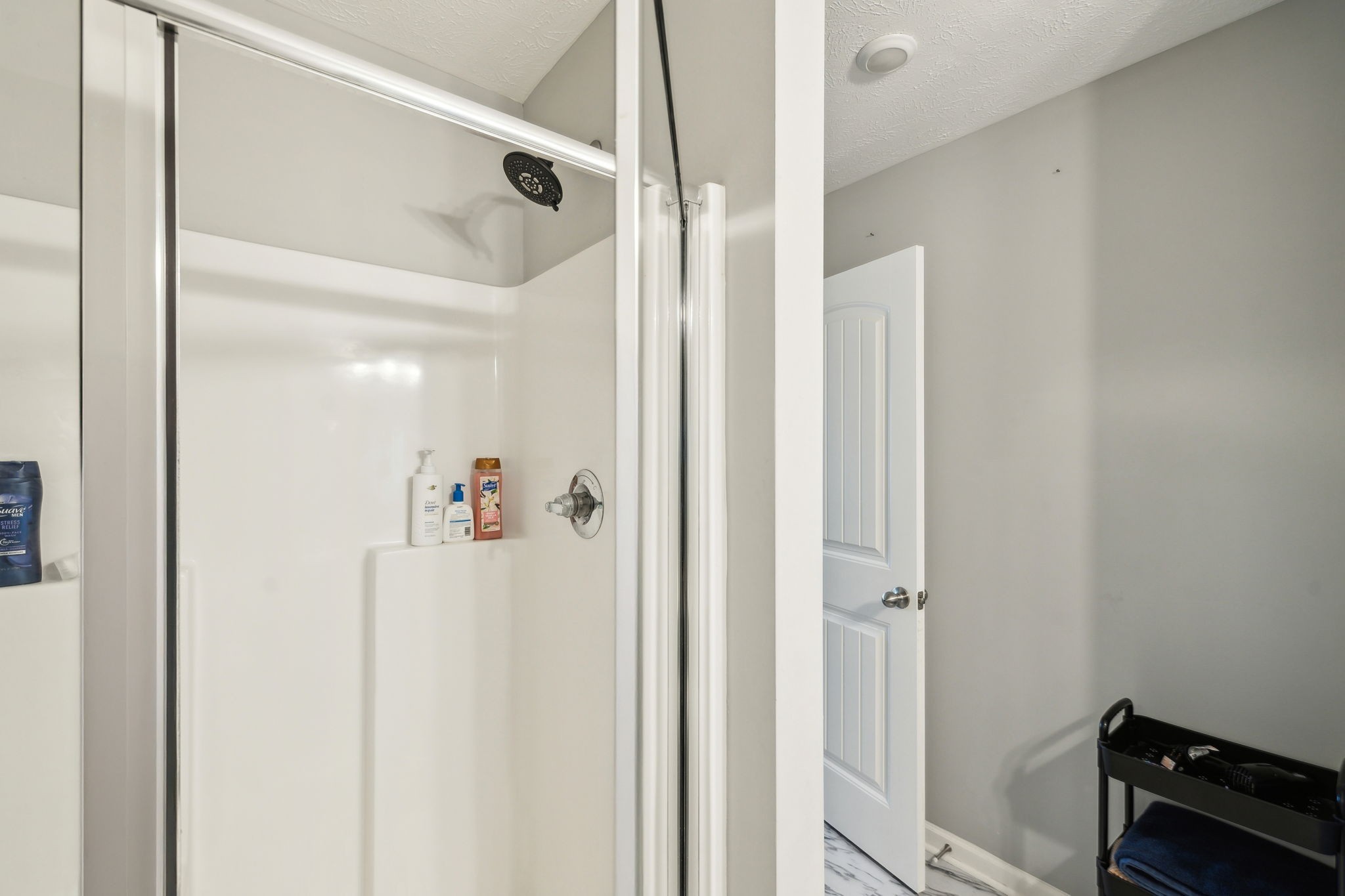 2336 Convention Way Murfreesboro, TN 37130 - Photo 16 of 23 a bathroom with a shower and a mirror