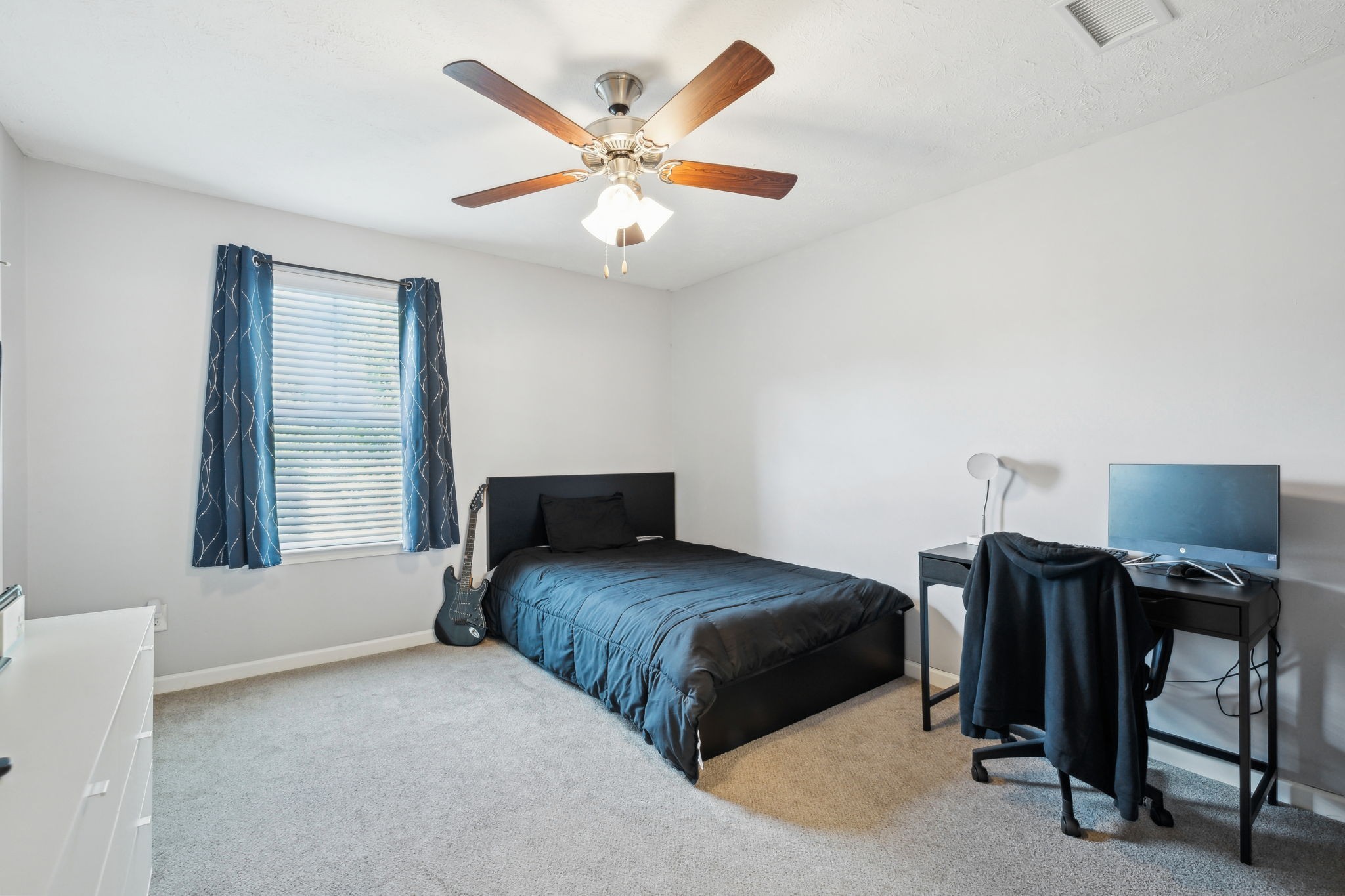 2336 Convention Way Murfreesboro, TN 37130 - Photo 18 of 23 a bedroom with a bed and a chandelier