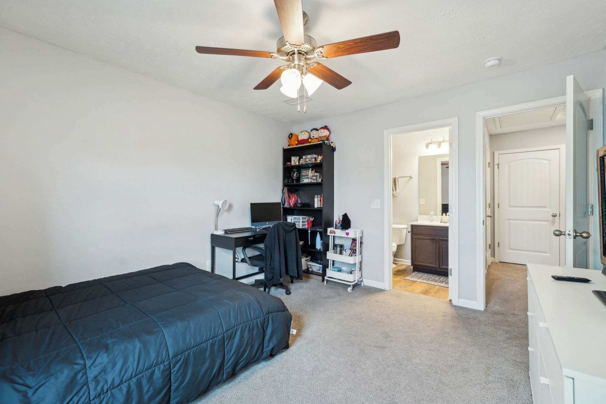 2336 Convention Way Murfreesboro, TN 37130 - Photo 19 of 23 a bedroom with a bed and a chandelier