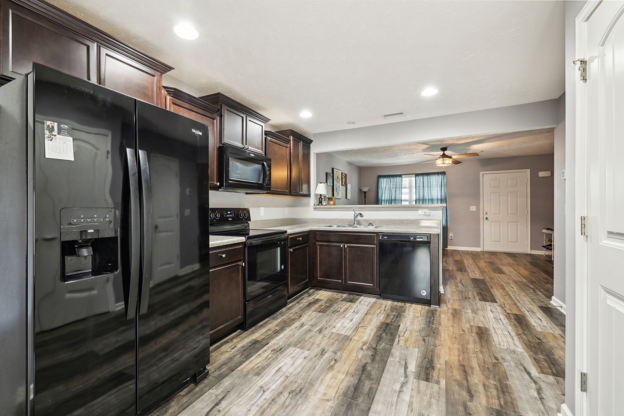2336 Convention Way Murfreesboro, TN 37130 - Photo 7 of 23 a large kitchen with stainless steel appliances and a refrigerator