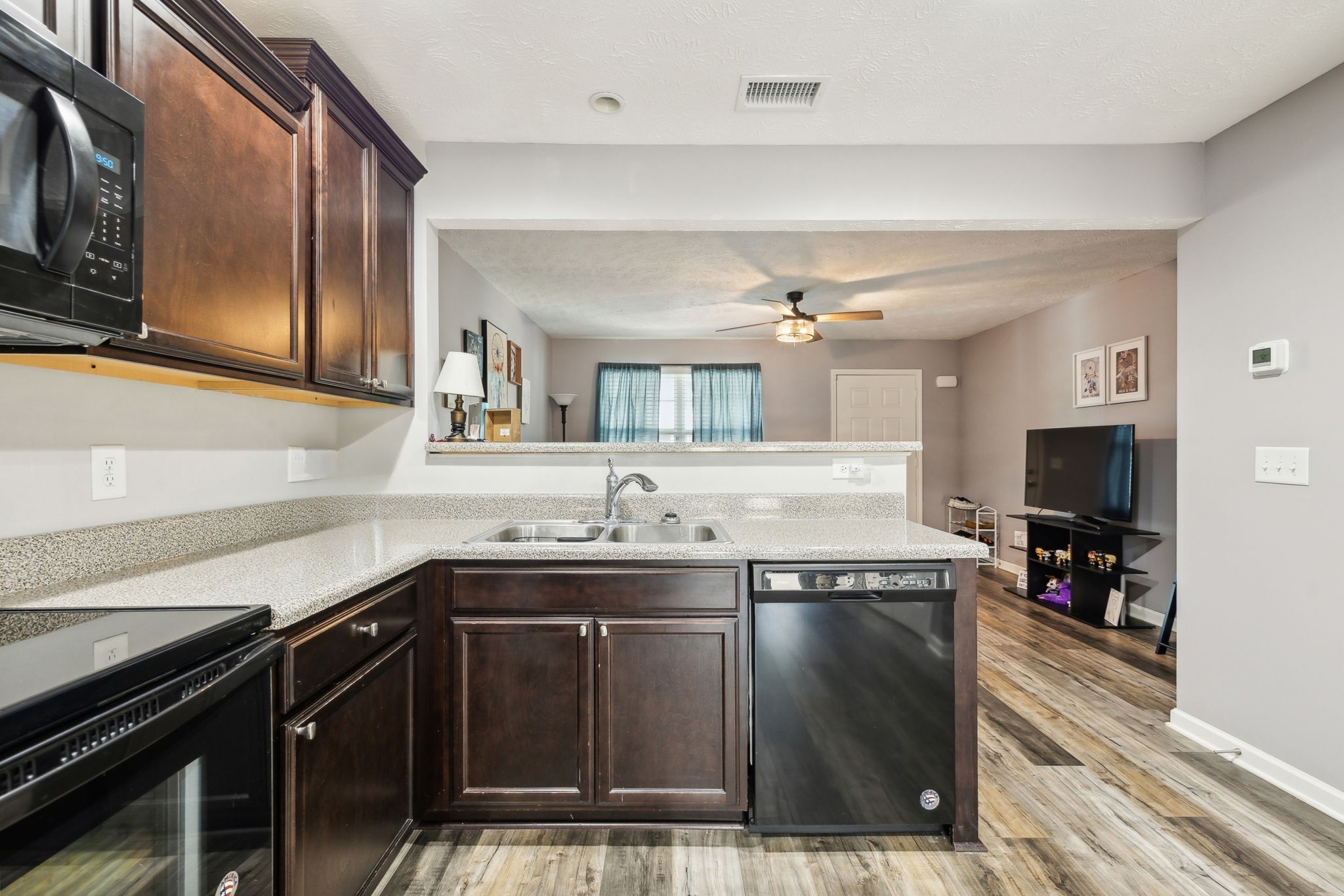 2336 Convention Way Murfreesboro, TN 37130 - Photo 8 of 23 a kitchen with granite countertop a sink and cabinets