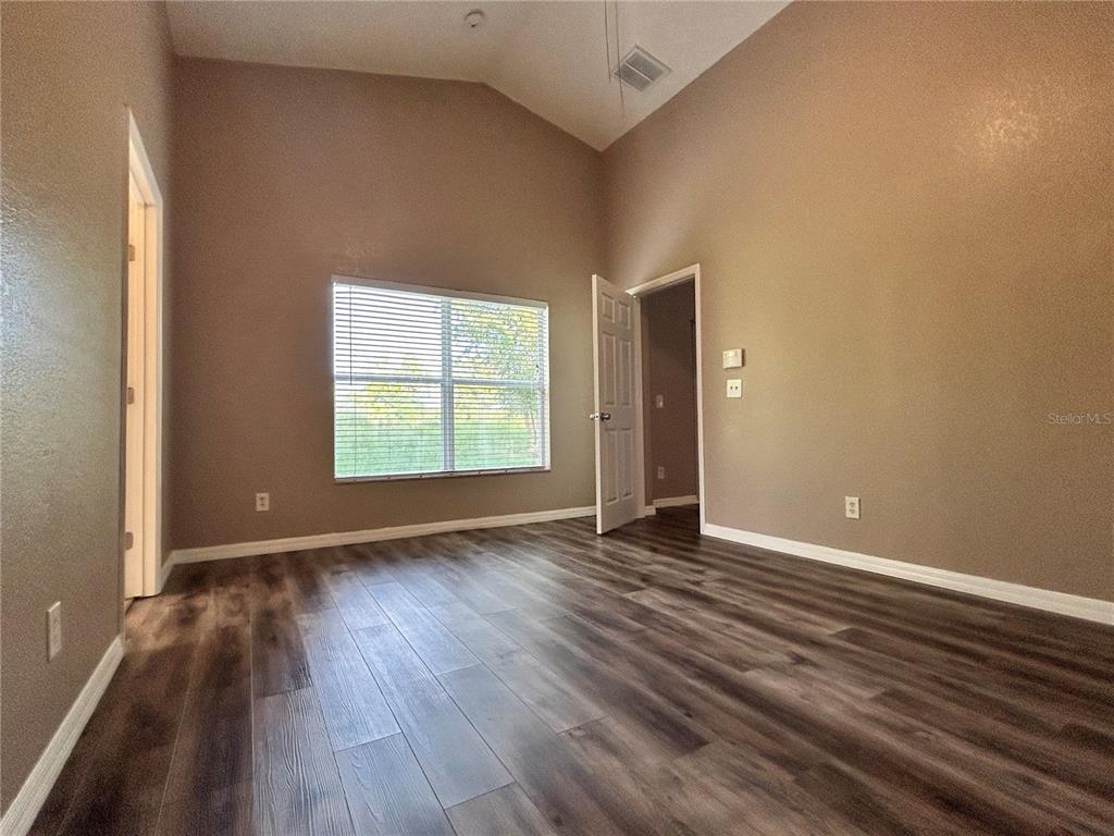 1230 Legatto Loop Dundee, FL 33838 - Photo 14 of 38 Primary Bedroom
