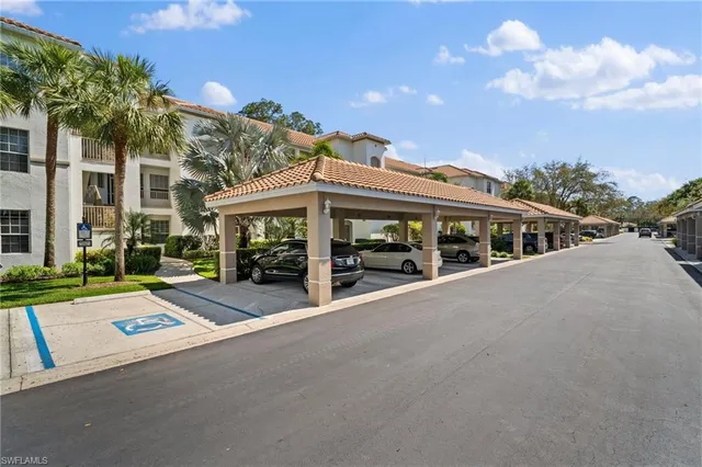 a view of a building with sitting area
