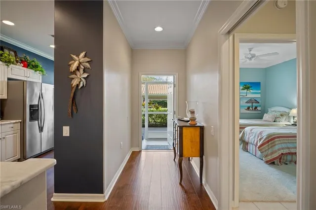 a bedroom with a bed and a walk in closet
