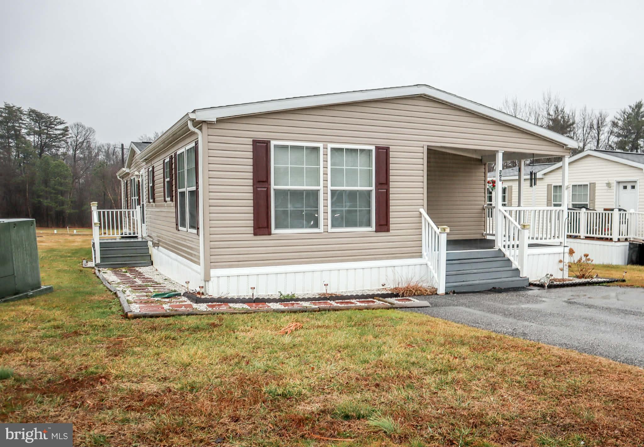 39 Queen Eleanor Drive Elkton, MD 21921 - Photo 2 of 11 a front view of a house with a yard