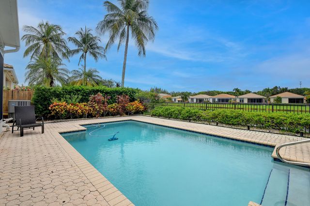 a view of a house with swimming pool