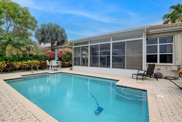 a view of a lake with a yard