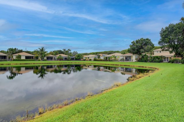 an aerial view of a houses with outdoor space and street view