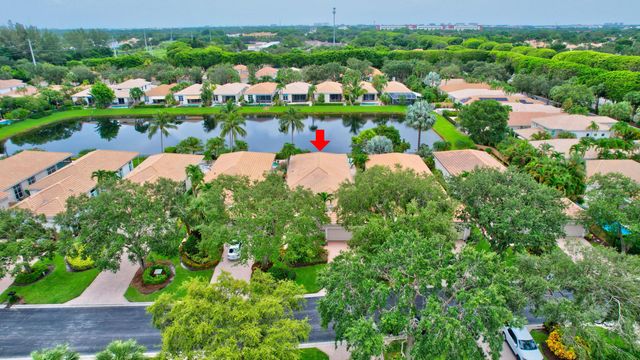 an aerial view of a houses with outdoor space and street view