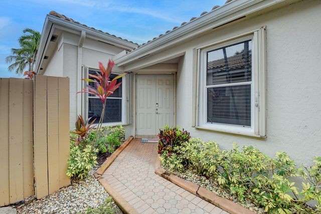 a front view of a house having yard